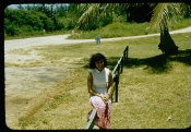 Saipan 1956 Collection, No. 46 Woman Sitting On Railing 